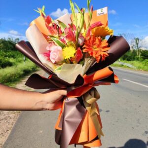 Orange wrapped Premium Flower Bouquet