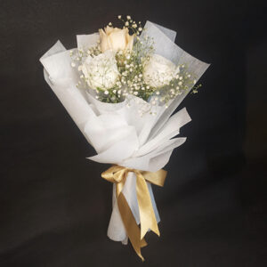 white flower bouquet with 3premium white roses tied up with golden ribbon