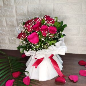 White wrapped premium red rose bouquet